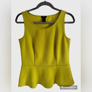 Ann Taylor peplum top in chartreuse with scoop neck.